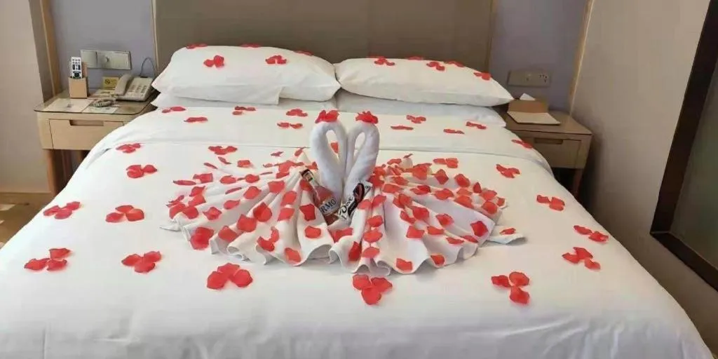 Bed in Vienna Hotel Guizhou Liupanshui Shuicheng Ancient Town