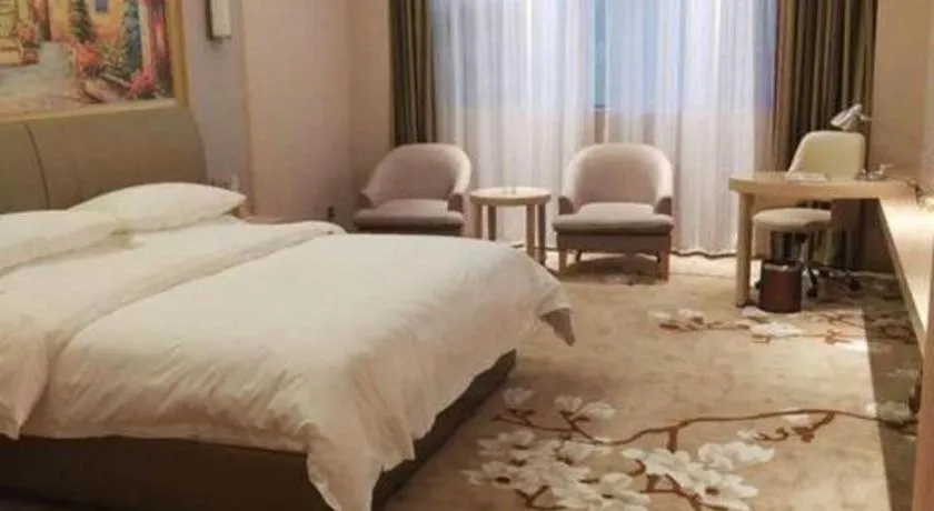 Bed in Vienna Hotel Guizhou Liupanshui Shuicheng Ancient Town