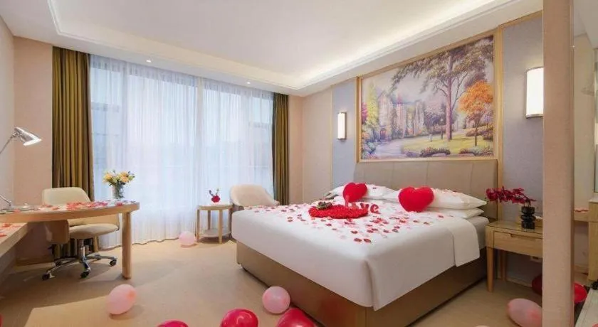 Bed in Vienna Hotel Guizhou Liupanshui Shuicheng Ancient Town