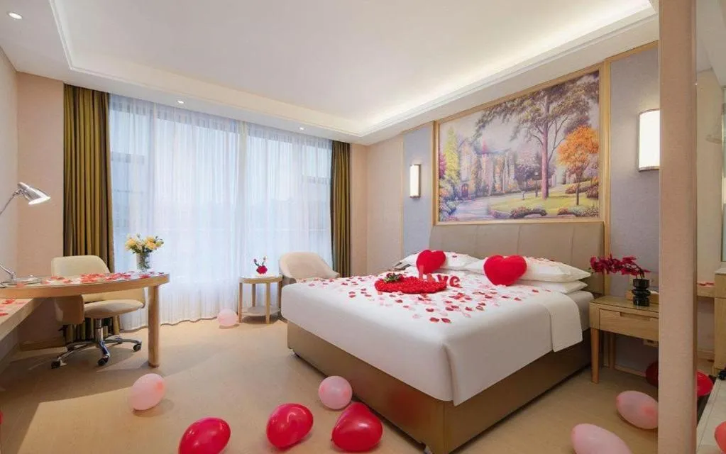 Bed in Vienna Hotel Guizhou Liupanshui Shuicheng Ancient Town