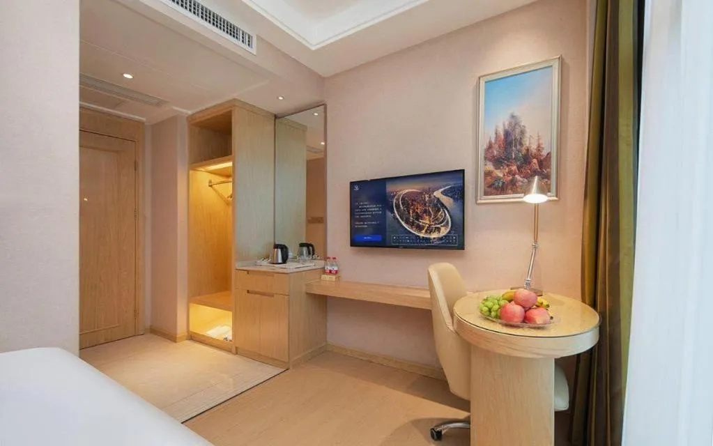 Bed in Vienna Hotel Guizhou Liupanshui Shuicheng Ancient Town