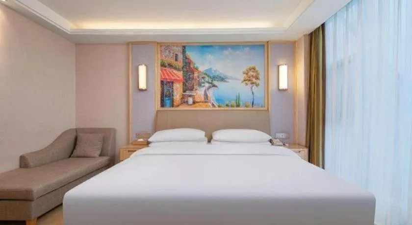 Bed in Vienna Hotel Guizhou Liupanshui Shuicheng Ancient Town