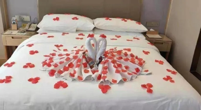 Bed in Vienna Hotel Guizhou Liupanshui Shuicheng Ancient Town