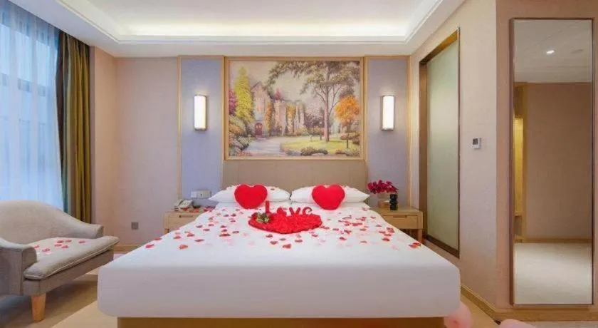 Bed in Vienna Hotel Guizhou Liupanshui Shuicheng Ancient Town