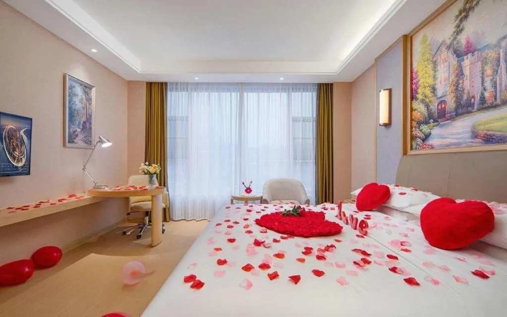 Bed in Vienna Hotel Guizhou Liupanshui Shuicheng Ancient Town