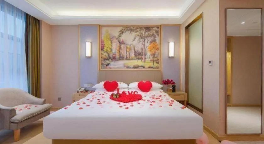 Bed in Vienna Hotel Guizhou Liupanshui Shuicheng Ancient Town