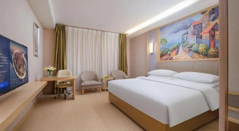 Bed in Vienna Hotel Guizhou Liupanshui Shuicheng Ancient Town