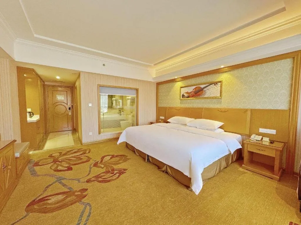 Bed in Vienna Hotel Guangxi Guilin Xing'an