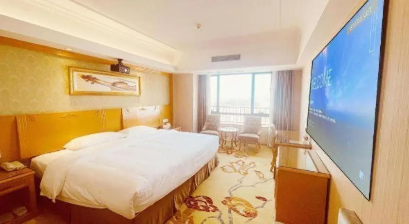 Bed in Vienna Hotel Guangxi Guilin Xing'an