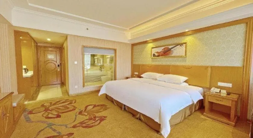 Bed in Vienna Hotel Guangxi Guilin Xing'an