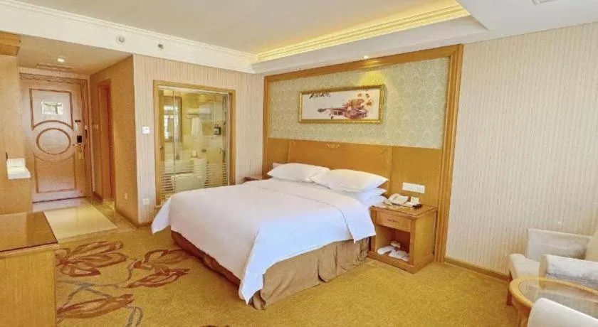 Bed in Vienna Hotel Guangxi Guilin Xing'an