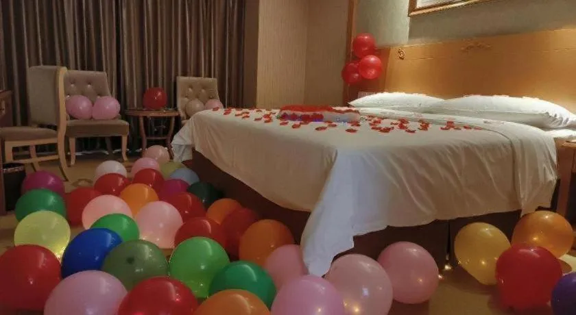 Bed in Vienna Hotel Guangxi Guilin Xing'an