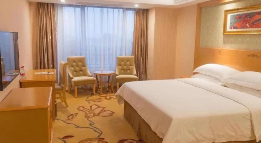 Bed in Vienna Hotel Guangxi Guilin Xing'an