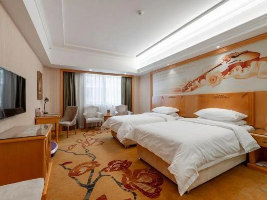Bed in Vienna Hotel Hunan Yueyang Linxiang