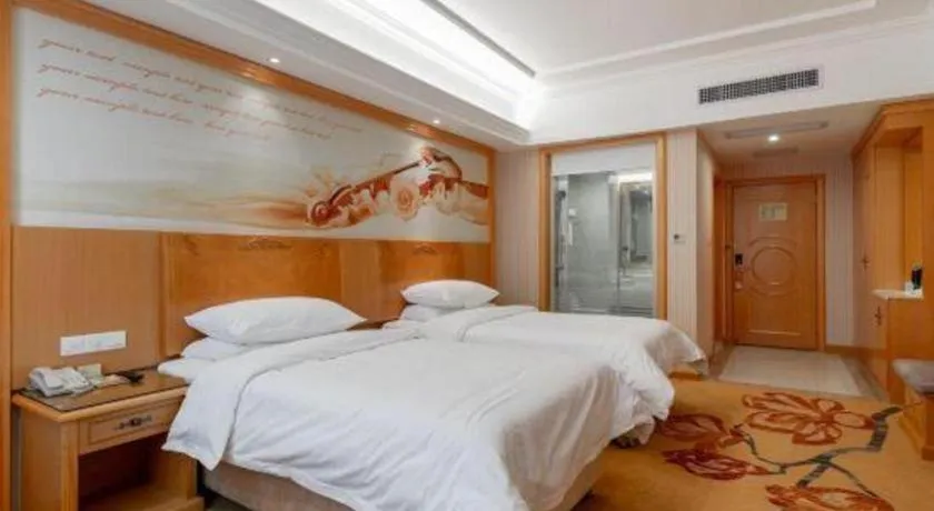 Bed in Vienna Hotel Hunan Yueyang Linxiang