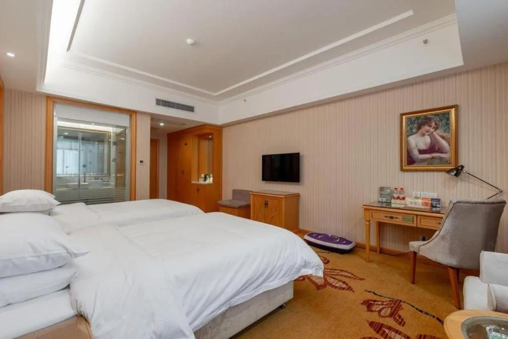 Bed in Vienna Hotel Hunan Yueyang Linxiang