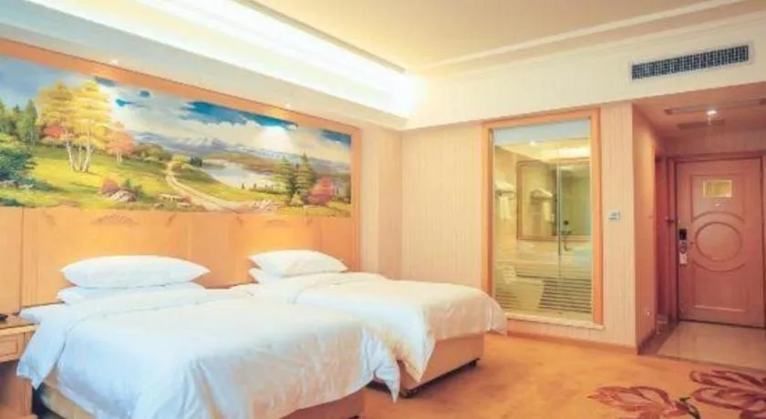 Bed in Vienna Hotel Hunan Yueyang Linxiang