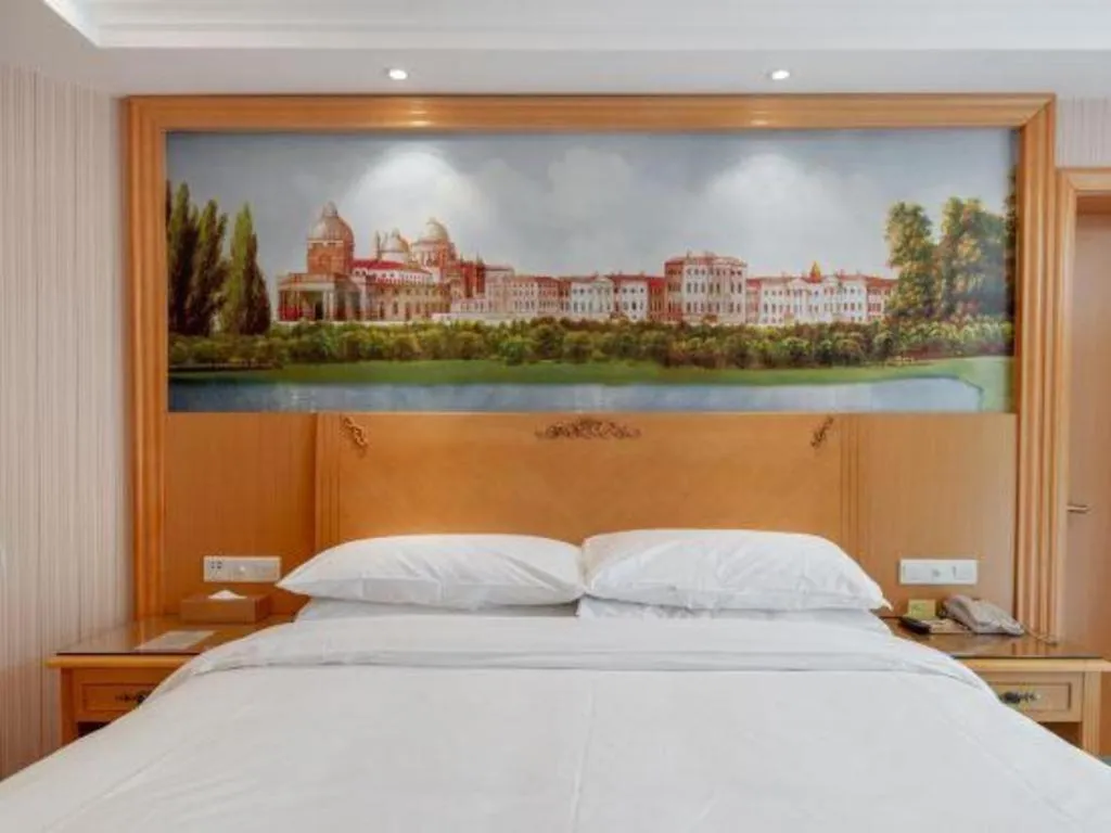 Bed in Vienna Hotel Hunan Yueyang Linxiang