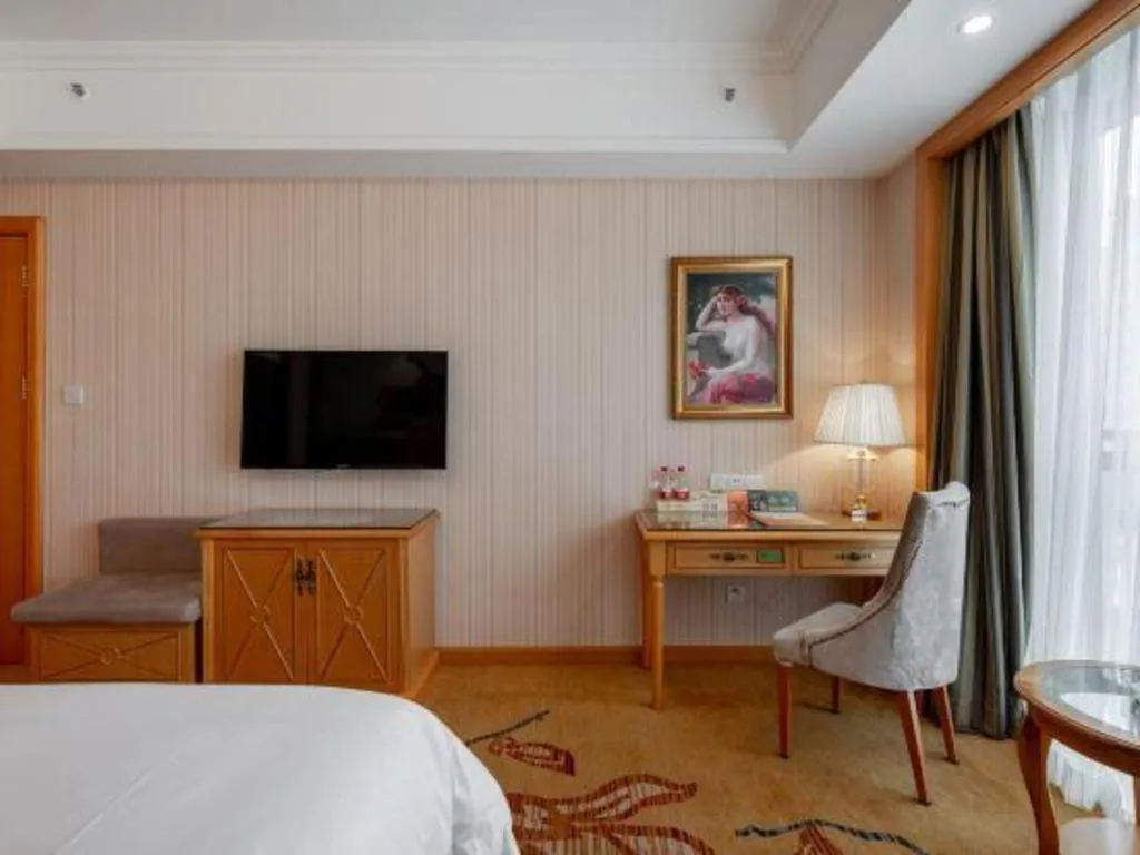 Bed in Vienna Hotel Hunan Yueyang Linxiang