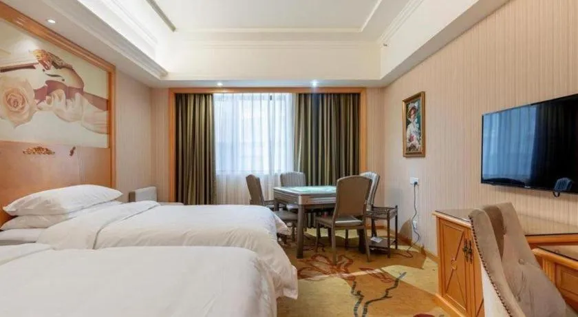 Bed in Vienna Hotel Hunan Yueyang Linxiang
