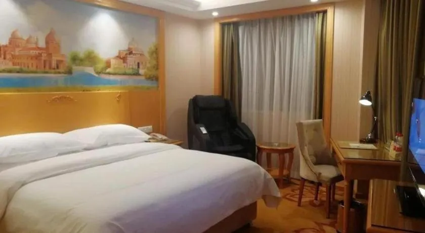 Bed in Vienna Hotel Hunan Yueyang Linxiang