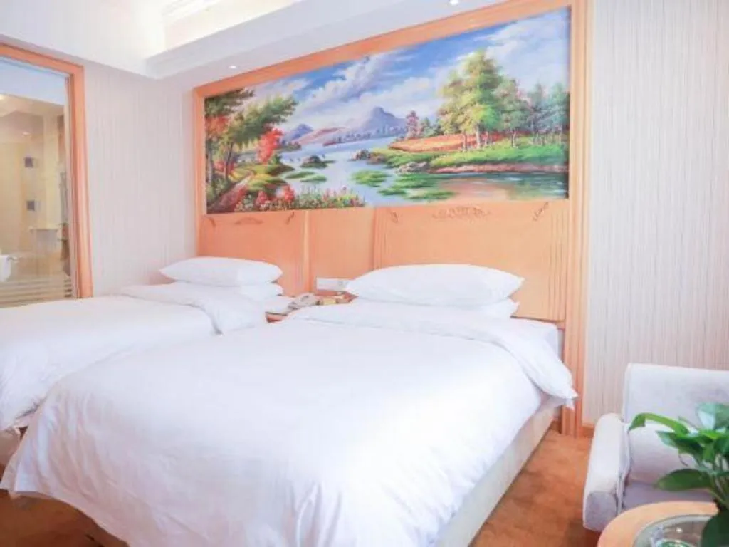 Bed in Vienna Hotel Hunan Yueyang Linxiang