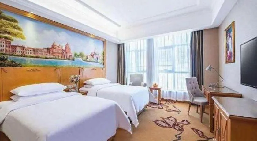 Bed in Vienna Hotel Hunan Yueyang Linxiang