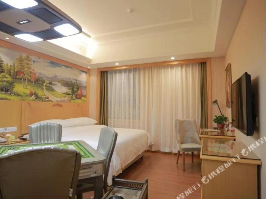 Bed in Vienna Hotel Hunan Yueyang Linxiang