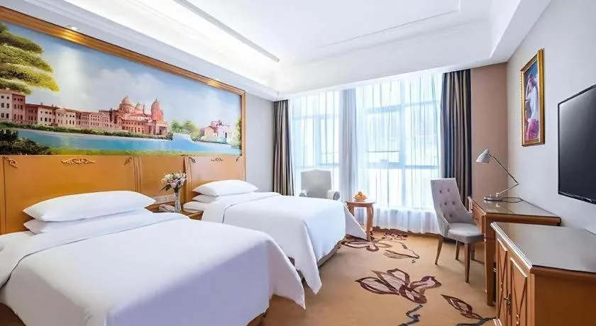 Bed in Vienna Hotel Hunan Yueyang Linxiang