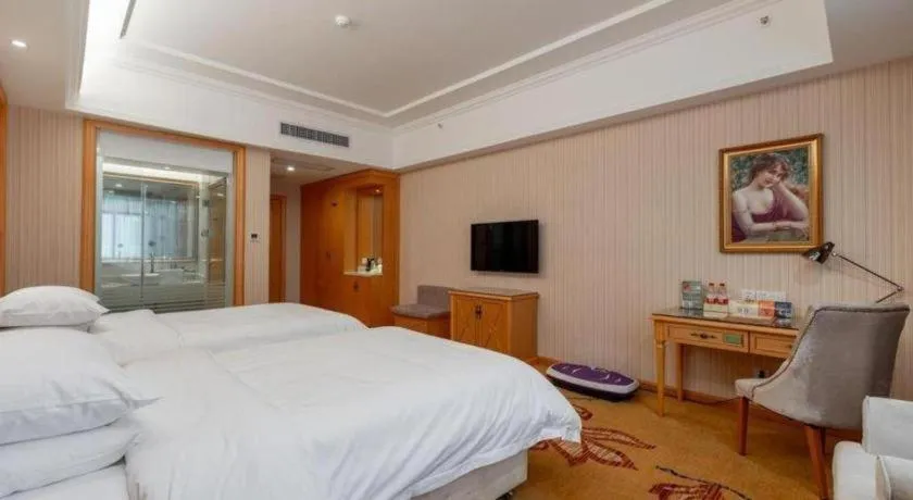 Bed in Vienna Hotel Hunan Yueyang Linxiang