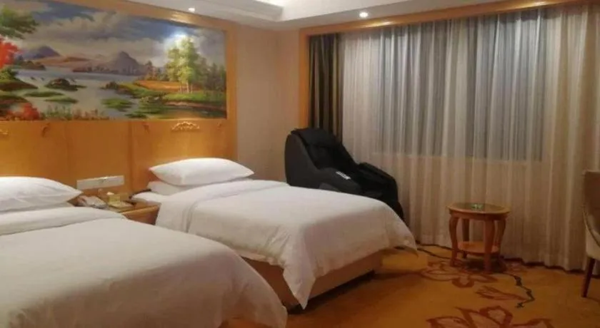 Bed in Vienna Hotel Hunan Yueyang Linxiang