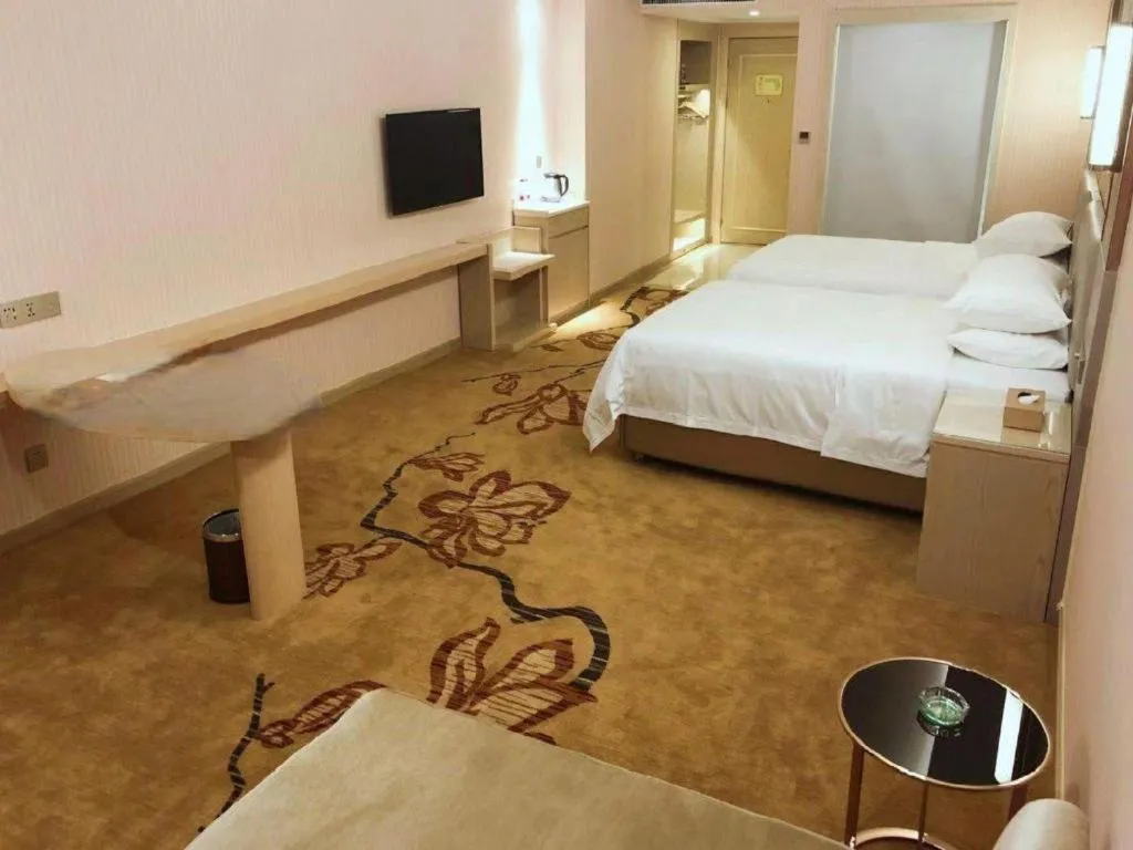 Bed in Vienna Hotel Guangdong Huizhou High-Speed North Railway Station Xiaojinkou