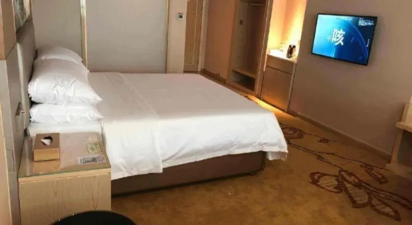 Bed in Vienna Hotel Guangdong Huizhou High-Speed North Railway Station Xiaojinkou