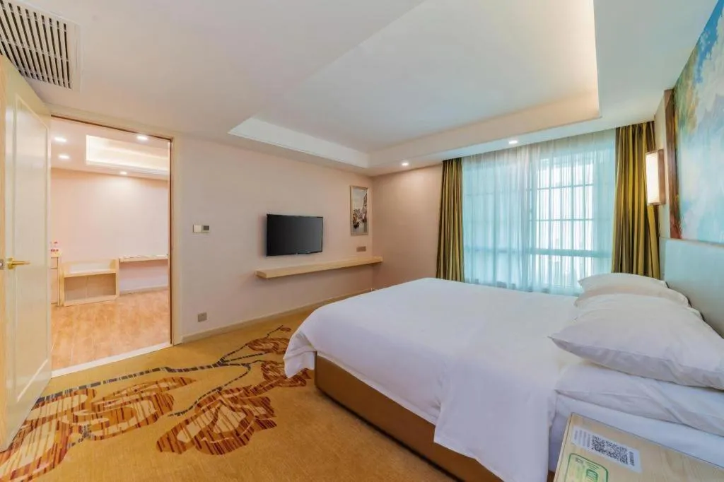Bed in Vienna Hotel Guangdong Huizhou High-Speed North Railway Station Xiaojinkou
