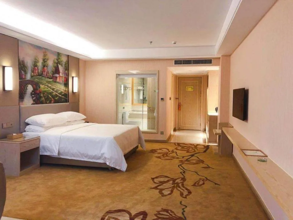 Bed in Vienna Hotel Guangdong Huizhou High-Speed North Railway Station Xiaojinkou