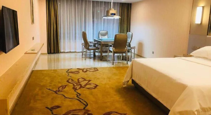 Bed in Vienna Hotel Guangdong Huizhou High-Speed North Railway Station Xiaojinkou