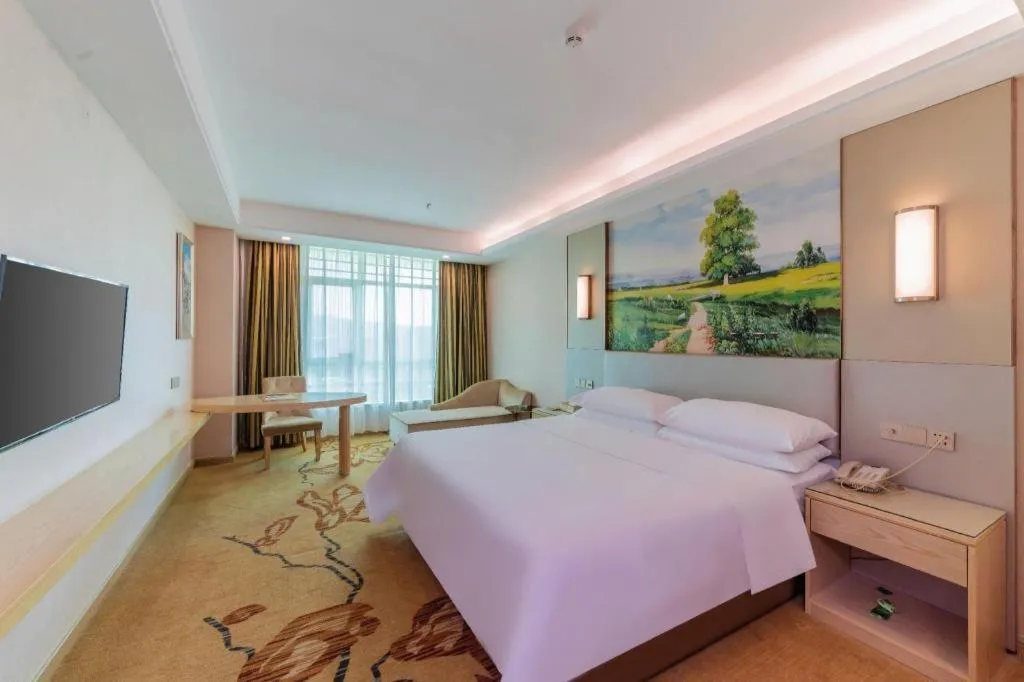 Bed in Vienna Hotel Guangdong Huizhou High-Speed North Railway Station Xiaojinkou