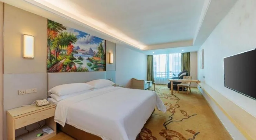 Bed in Vienna Hotel Guangdong Huizhou High-Speed North Railway Station Xiaojinkou