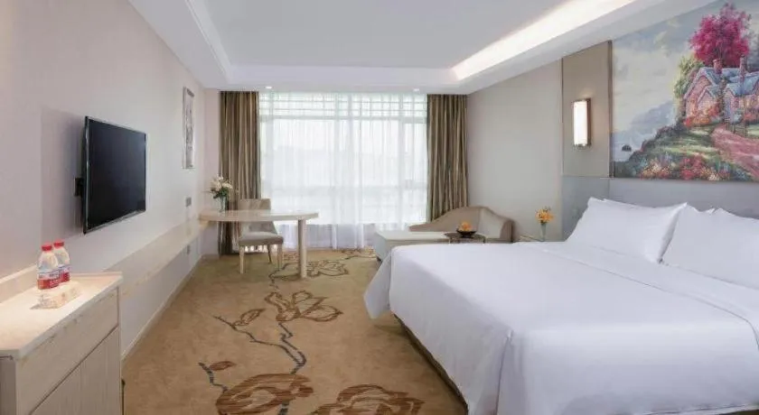Bed in Vienna Hotel Guangdong Huizhou High-Speed North Railway Station Xiaojinkou