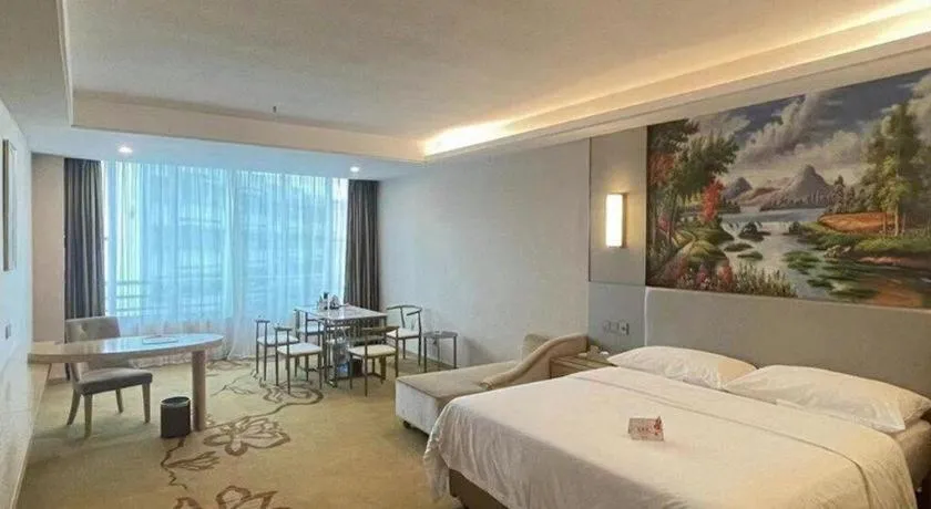 Bed in Vienna Hotel Guangdong Huizhou High-Speed North Railway Station Xiaojinkou