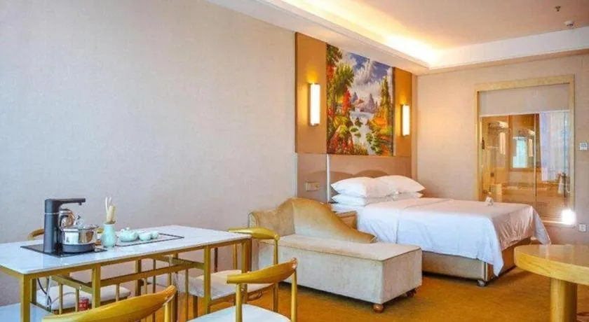 Bed in Vienna Hotel Guangdong Huizhou High-Speed North Railway Station Xiaojinkou