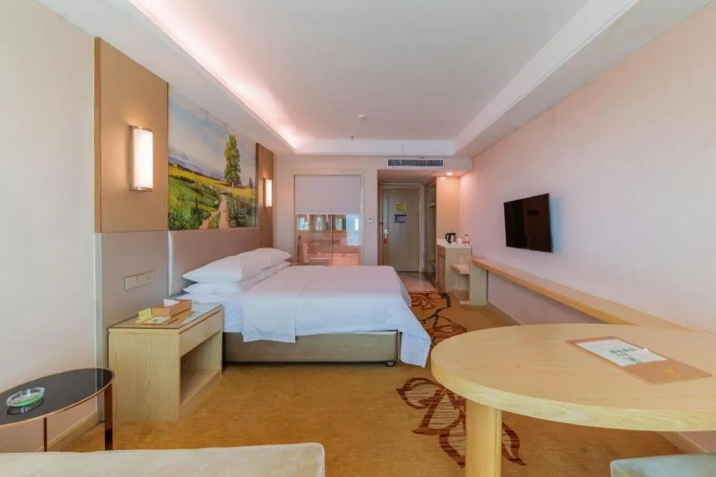 Bed in Vienna Hotel Guangdong Huizhou High-Speed North Railway Station Xiaojinkou