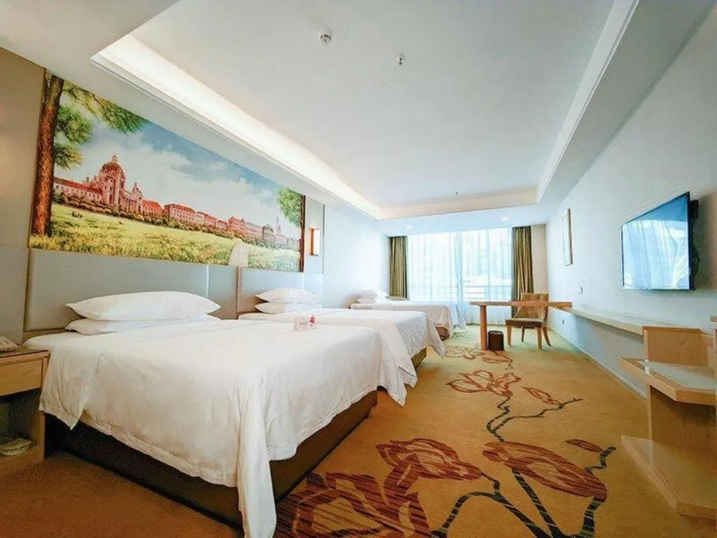 Bed in Vienna Hotel Guangdong Huizhou High-Speed North Railway Station Xiaojinkou