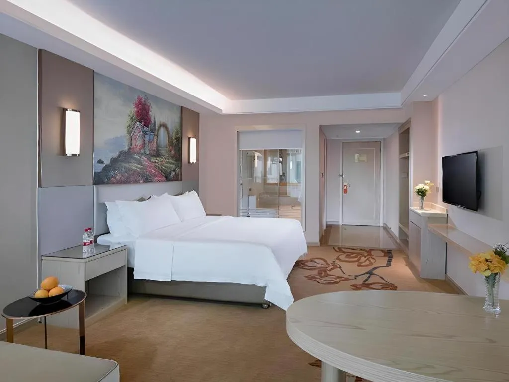Bed in Vienna Hotel Guangdong Huizhou High-Speed North Railway Station Xiaojinkou