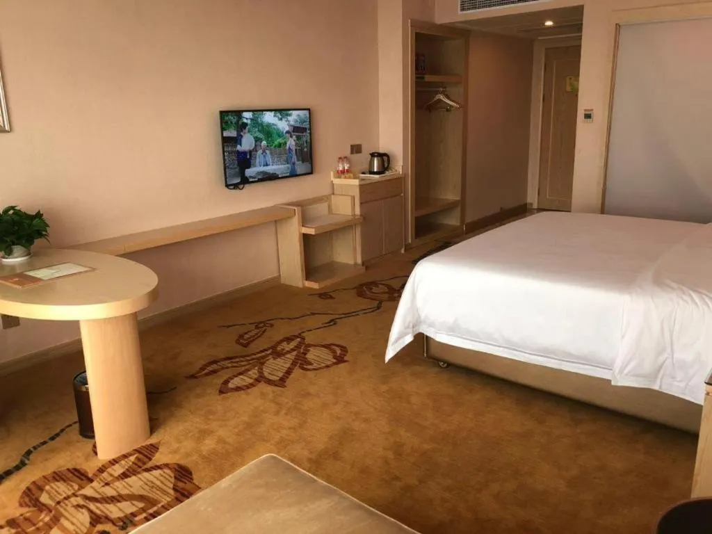 Bed in Vienna Hotel Guangdong Huizhou High-Speed North Railway Station Xiaojinkou