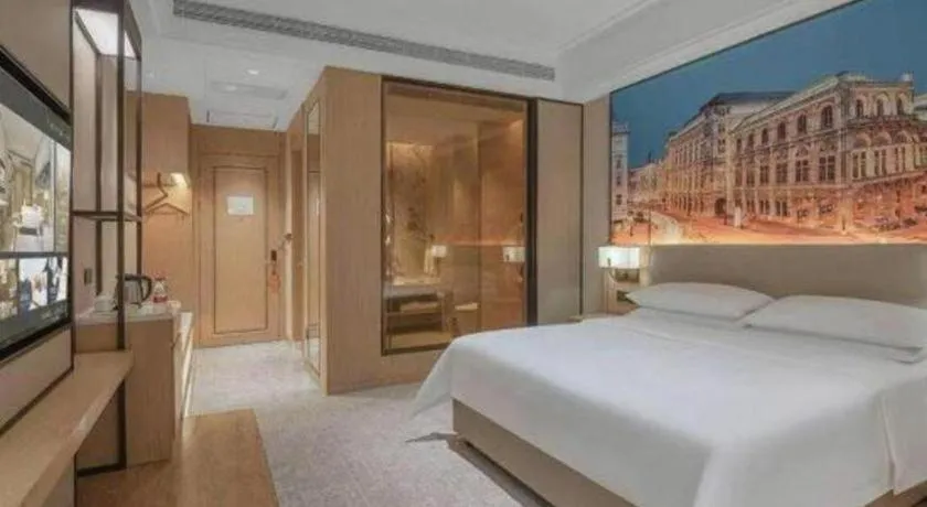 Bed in Vienna Hotel Yongzhou Dong'an High-Speed Railway Station