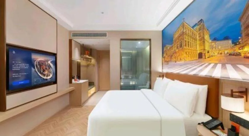Bed in Vienna Hotel Yongzhou Dong'an High-Speed Railway Station