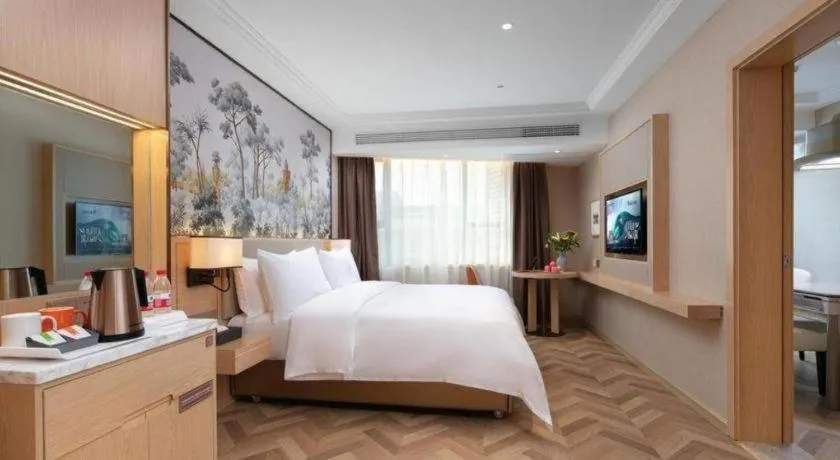Bed in Vienna Hotel Yongzhou Dong'an High-Speed Railway Station