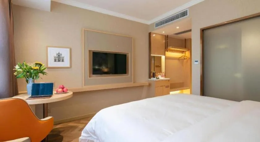 Bed in Vienna Hotel Yongzhou Dong'an High-Speed Railway Station