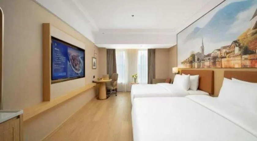 Bed in Vienna Hotel Yongzhou Dong'an High-Speed Railway Station